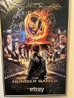 Original hunger games movie poster signed by whole cast